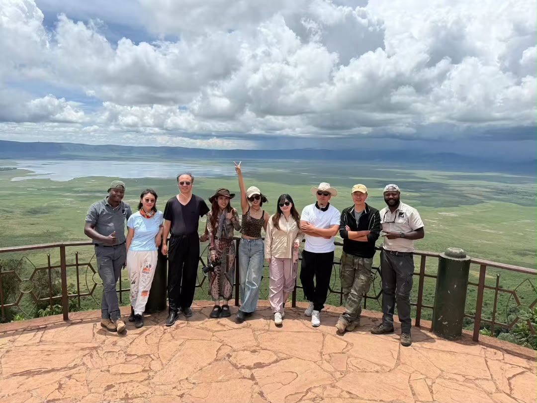 Guests and guides at the Ngorongoro Crater rim viewpoint above the crater floor